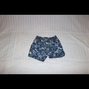 Baby boys frog and leaf print shorts.